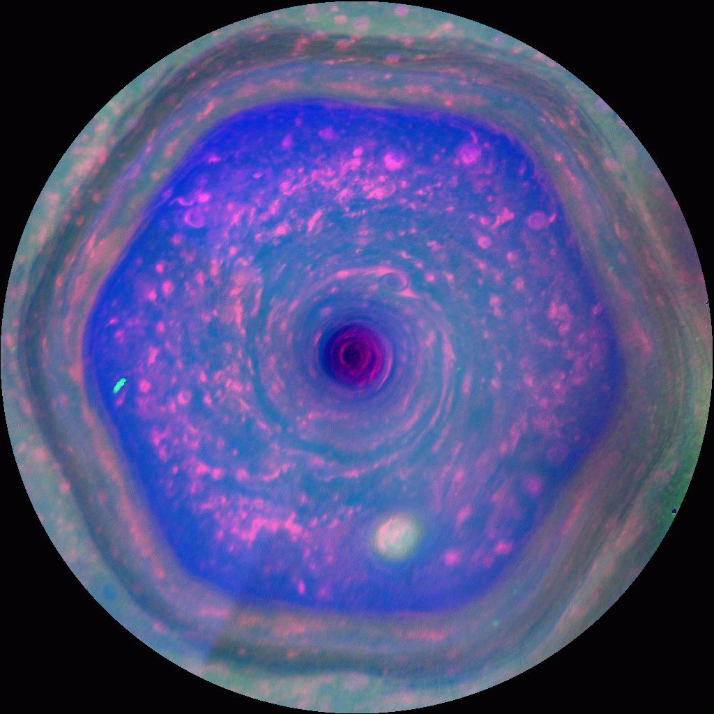 Close-up view of Saturn's hexagonal polar storm system with detailed cloud structure and geometric edges